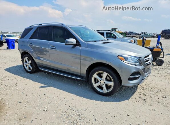 4JGDA5HB1GA707061 2016 MERCEDES-BENZ GLE Silver Front right