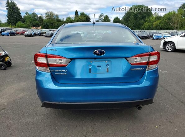 4S3GKAA68J3603568 2018 SUBARU IMPREZA Turquoise Rear view