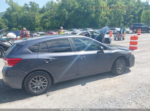 4S3GTAA65H3740409 2017 SUBARU IMPREZA Black Rear interior view
