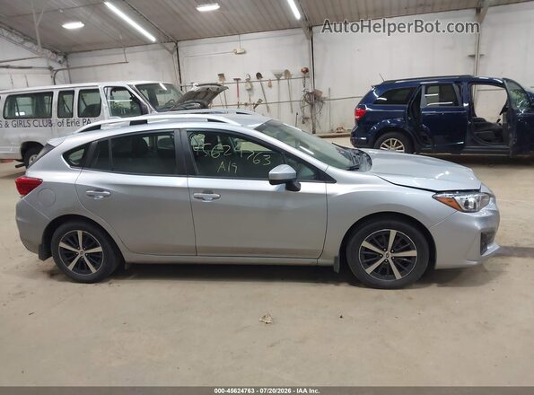 4S3GTAD64K3719327 2019 SUBARU IMPREZA Silver Vista interior trasera