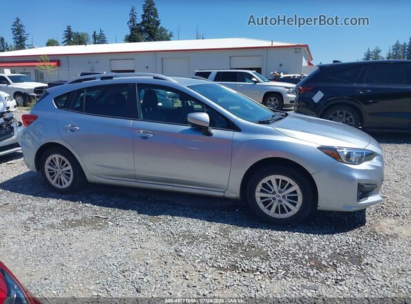 4S3GTAD69H3740635 2017 SUBARU IMPREZA Silver Vista interior trasera