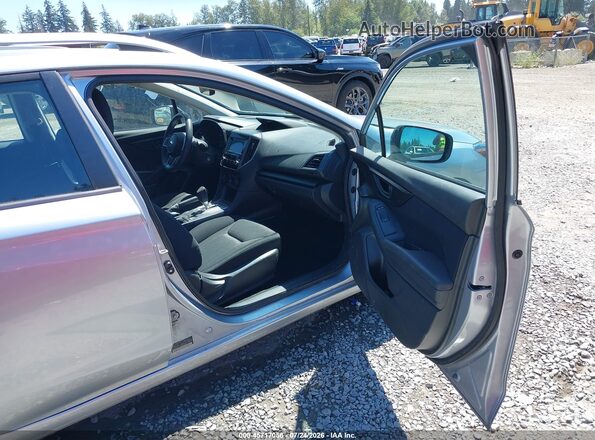 4S3GTAD69H3740635 2017 SUBARU IMPREZA Silver Vista interior delantera