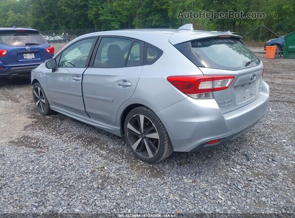 4S3GTAJ69K3706271 2019 SUBARU IMPREZA Silver Trasero izquierdo