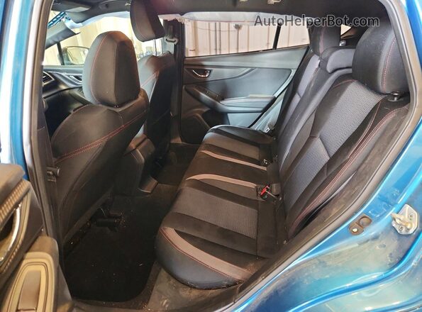 4S3GTAL68J3717192 2018 SUBARU IMPREZA Blue Rear interior view