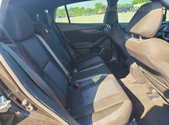 4S3GTAM62J3702279 2018 SUBARU IMPREZA Black Rear interior view