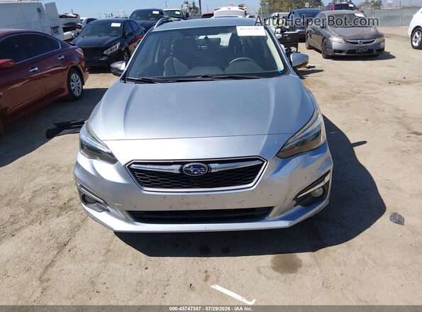 4S3GTAN67H3737697 2017 SUBARU IMPREZA Gray Սալոնի հետևի տեսք