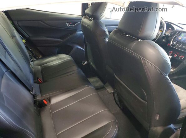 4S3GTAT67L3734312 2020 SUBARU IMPREZA Black Rear seats view