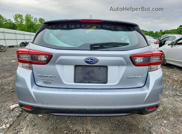4S3GTAV68P3709857 2023 SUBARU IMPREZA Silver Вид ззаду