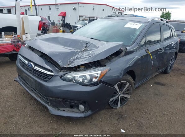 4S3GTAV69L3715113 2020 SUBARU IMPREZA Dark Blue Vista tres cuartos delantera izquierda