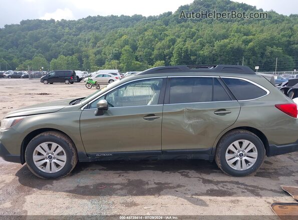4S4BSAFC2K3276106 2019 SUBARU OUTBACK Green უკანა სალონის ხედი