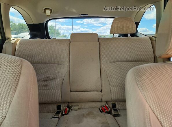 4S4BSAFC5J3270914 2018 SUBARU OUTBACK Cream Vista de los asientos traseros