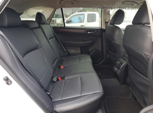 4S4BSAKC7J3279944 2018 SUBARU OUTBACK White Rear interior view