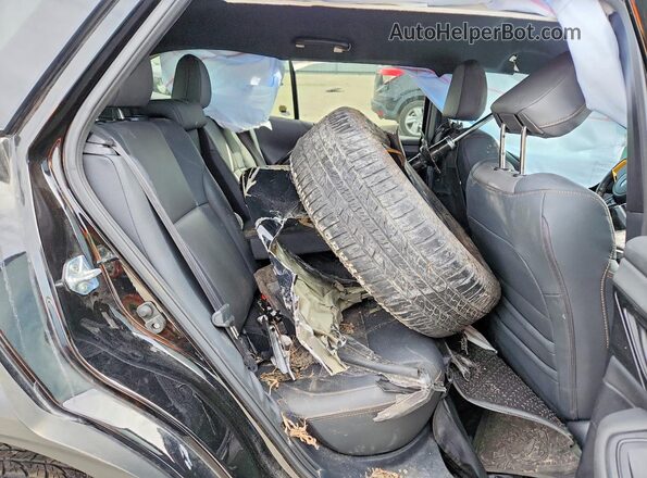 4S4BTGSD4R3292932 2024 SUBARU OUTBACK Black Вид задньої частини салону