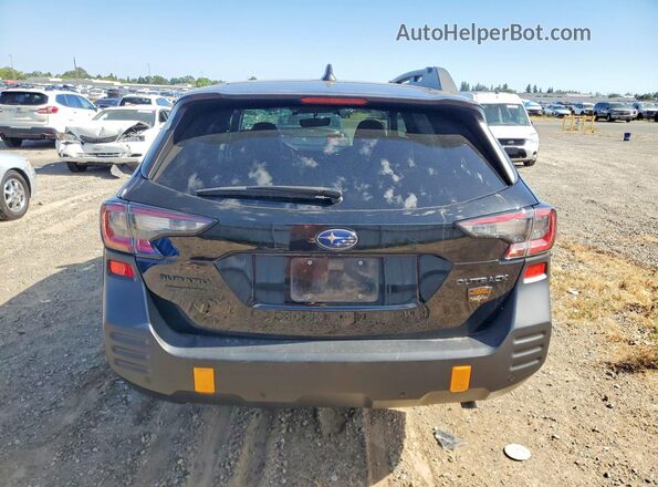 4S4BTGUD2N3184896 2022 SUBARU OUTBACK Black Rear view
