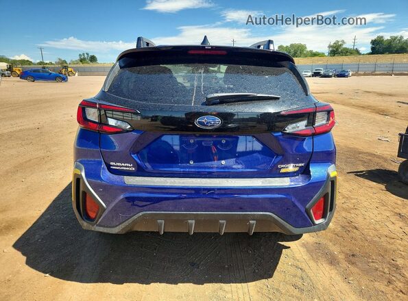 4S4GUHF62R3702681 2024 SUBARU CROSSTREK Blue Rear view