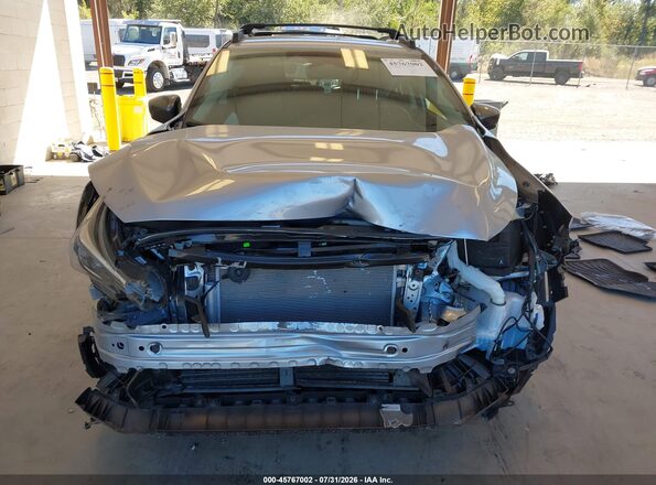 4S4GUHL6XR3729664 2024 SUBARU CROSSTREK Silver Rear interior view