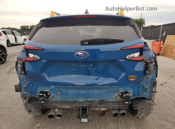 4S4GUHT63R3761212 2024 SUBARU CROSSTREK Blue Rear view