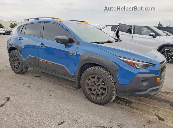 4S4GUHT63R3761212 2024 SUBARU CROSSTREK Blue Front right