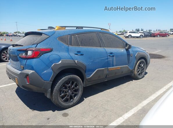 4S4GUHT65R3779453 2024 SUBARU CROSSTREK Blue Rear interior view