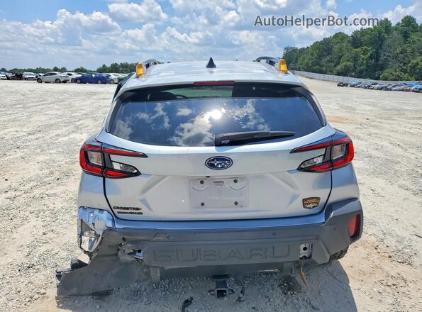 4S4GUHT68R3722972 2024 SUBARU CROSSTREK Silver Հետևի տեսք