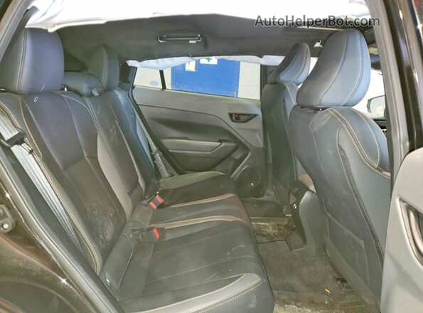 4S4GUHU61R3811202 2024 SUBARU CROSSTREK Black Vista interior trasera