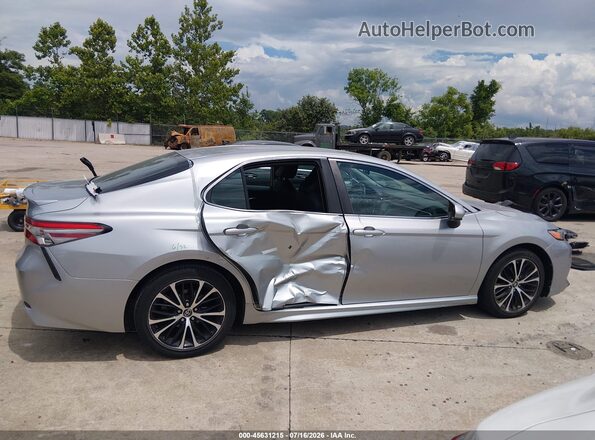 4T1B11HK5JU071315 2018 TOYOTA CAMRY Gray Rear interior view