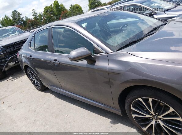 4T1B11HK5KU210876 2019 TOYOTA CAMRY Gray Rear interior view