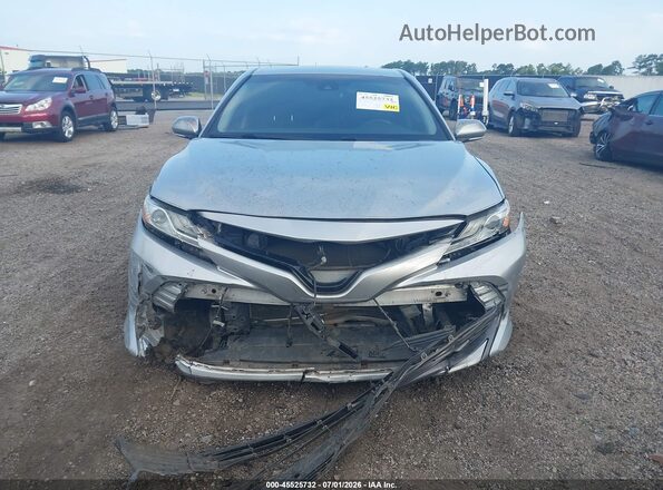 4T1B11HK6JU080718 2018 TOYOTA CAMRY Silver Rear interior view