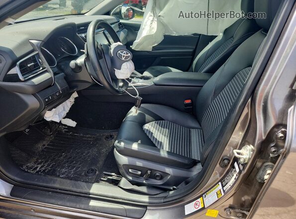 4T1B11HK8KU229566 2019 TOYOTA CAMRY Charcoal Front interior view