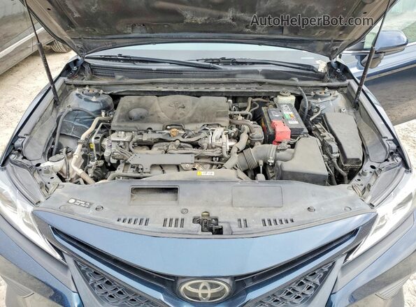 4T1B11HKXJU627621 2018 TOYOTA CAMRY Blue Rear interior view