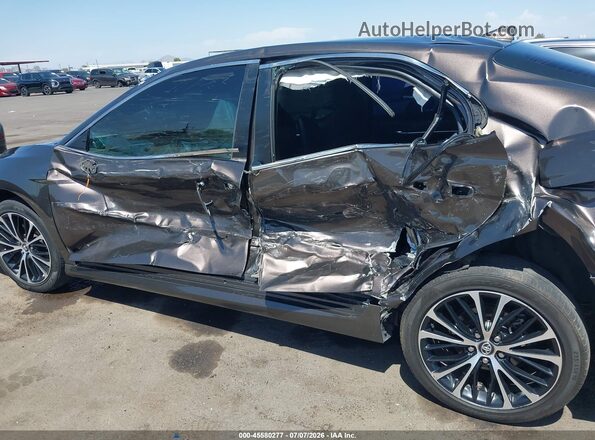 4T1B31HK3KU005244 2019 TOYOTA CAMRY HYBRID Brown Вид задньої частини салону