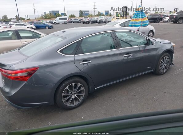 4T1BD1EB0JU063392 2018 TOYOTA AVALON HYBRID Gray Սալոնի հետևի տեսք