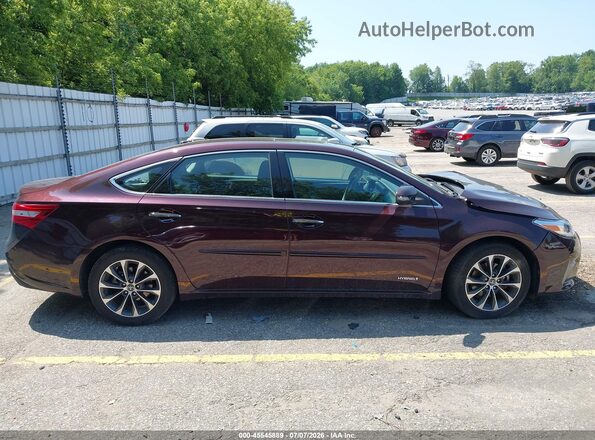 4T1BD1EB9GU056031 2016 TOYOTA AVALON HYBRID Maroon Widok wnętrza z tyłu
