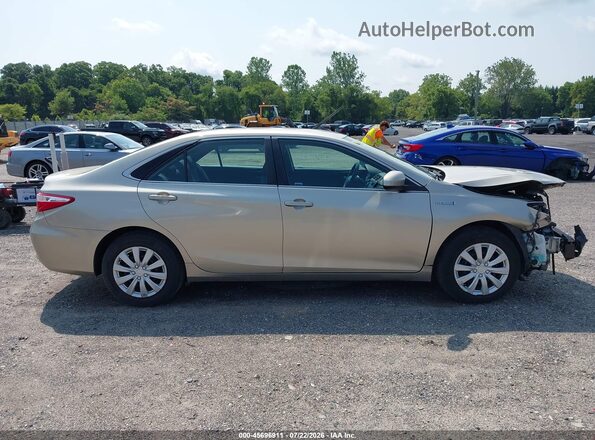 4T1BD1FK9GU186261 2016 TOYOTA CAMRY HYBRID Beige Widok wnętrza z tyłu