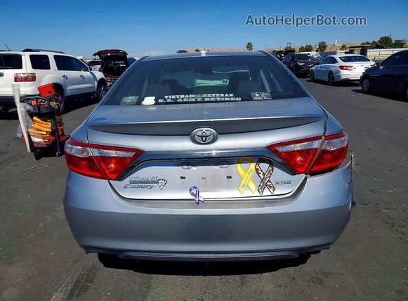 4T1BF1FK2GU121908 2016 TOYOTA CAMRY Silver Rear view