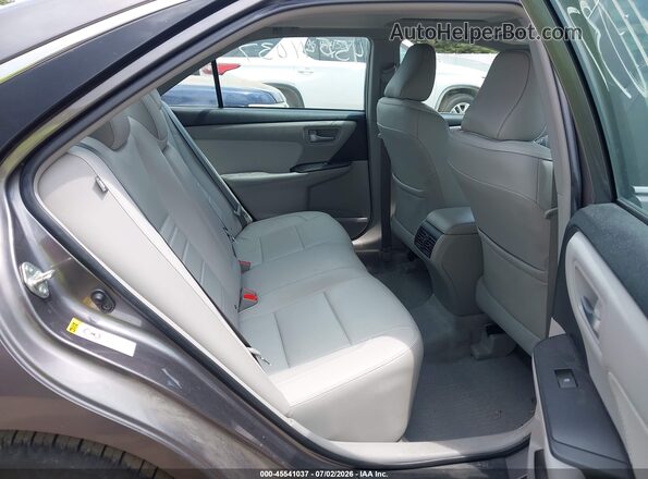 4T1BF1FK2GU574958 2016 TOYOTA CAMRY Gray Widok naklejki z numerem VIN