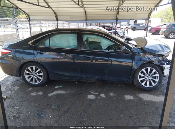 4T1BF1FK2HU281658 2017 TOYOTA CAMRY Black Widok wnętrza z tyłu