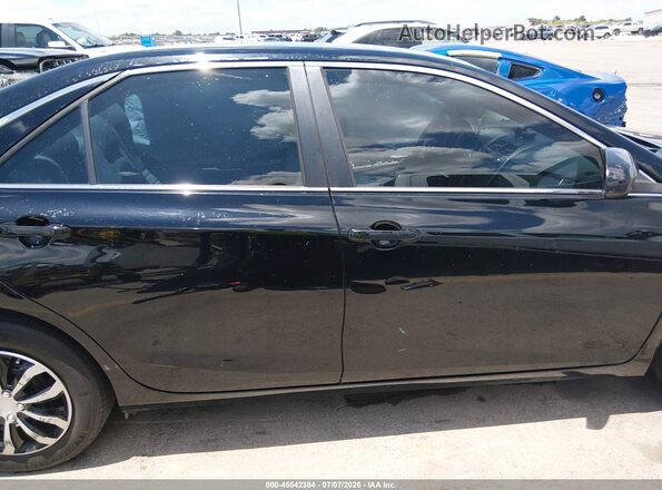 4T1BF1FK2HU402947 2017 TOYOTA CAMRY Black Vista interior trasera