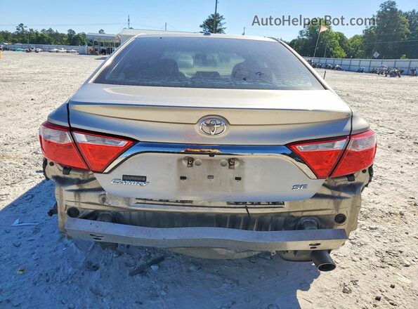 4T1BF1FK4GU520576 2016 TOYOTA CAMRY Tan Rear view