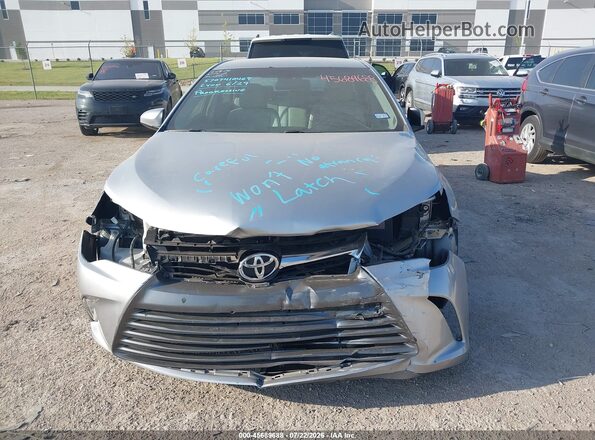 4T1BF1FK4HU393684 2017 TOYOTA CAMRY Silver ხელსაწყოთა პანელის ხედი