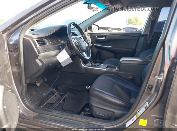 4T1BF1FK5GU171136 2016 TOYOTA CAMRY Gray Front interior view