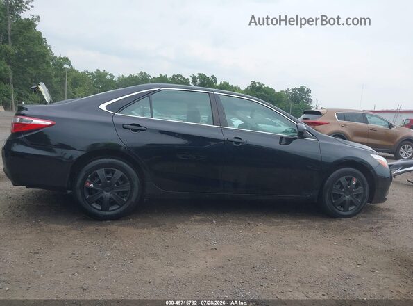 4T1BF1FK5HU378949 2017 TOYOTA CAMRY Black Rear interior view