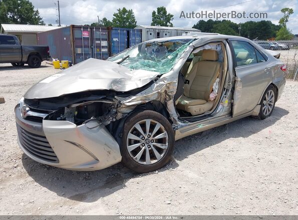 4T1BF1FK5HU639836 2017 TOYOTA CAMRY Gold Առջևի ձախ երեք քառորդ տեսարան