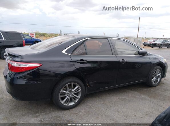 4T1BF1FK6GU175535 2016 TOYOTA CAMRY 4D 2WD Black Rear interior view