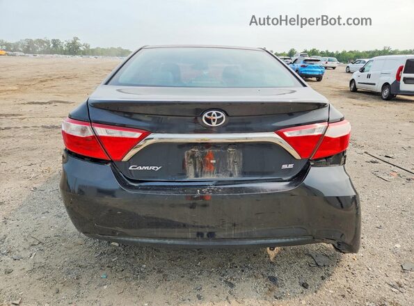 4T1BF1FK7GU175771 2016 TOYOTA CAMRY Black Rear view