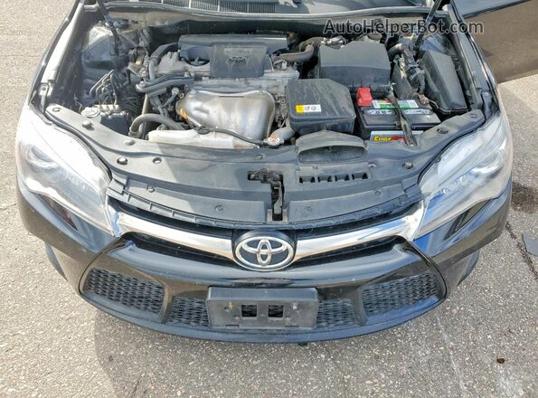 4T1BF1FK7HU815561 2017 TOYOTA CAMRY Black Rear interior view