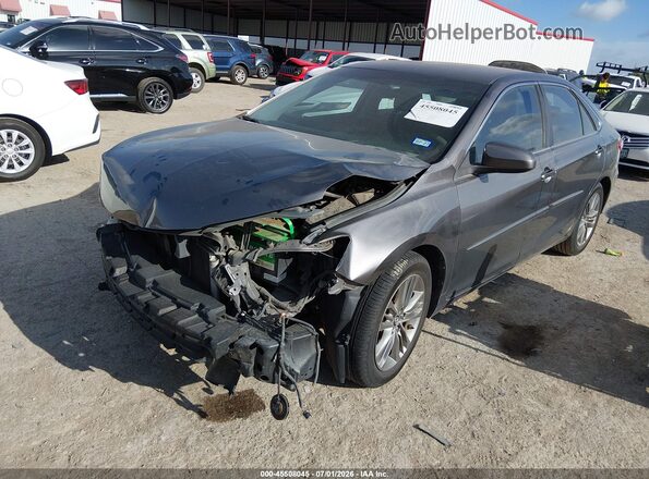 4T1BF1FK8GU165444 2016 TOYOTA CAMRY Gray Vista tres cuartos delantera izquierda