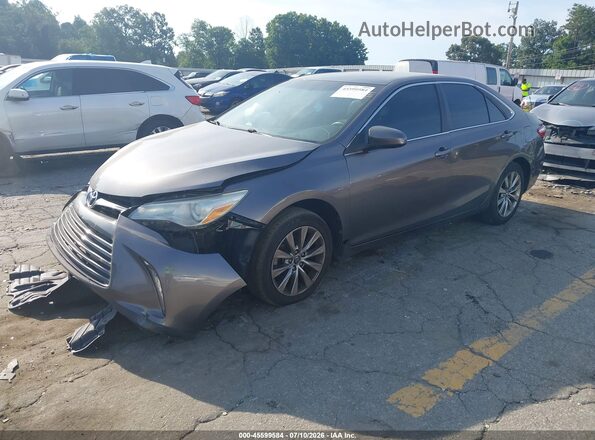 4T1BF1FK9GU581003 2016 TOYOTA CAMRY Gray Vista tres cuartos delantera izquierda