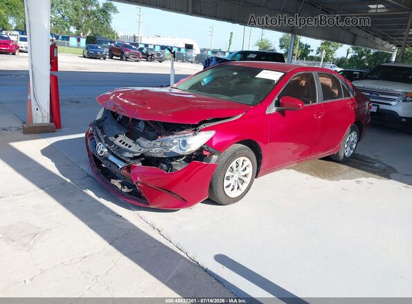 4T1BF1FK9GU606949 2016 TOYOTA CAMRY Maroon Առջևի ձախ երեք քառորդ տեսարան