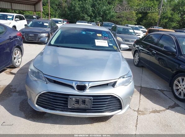 4T1BK1EB0GU210552 2016 TOYOTA AVALON Серебряный Вид задней части салона